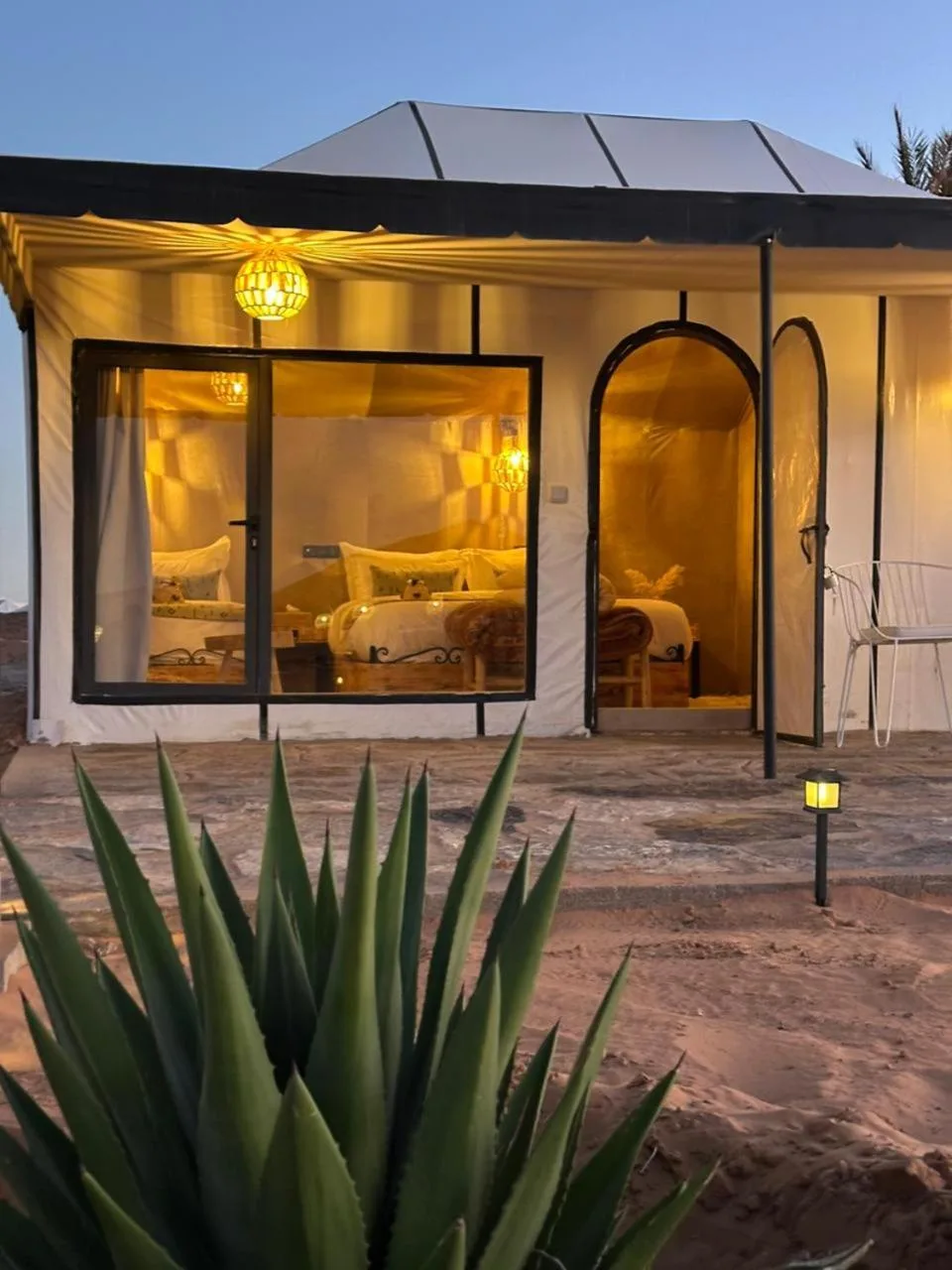 Exterior view of a tent at Peaceful Luxury Camp in Merzouga