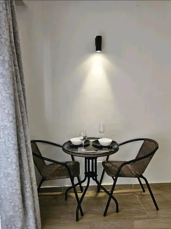 Pinnacle Suites Nairobi small dining table for two