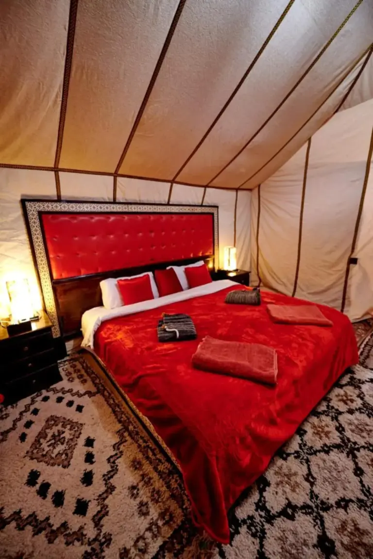 Luxurious tent bedroom at Private Luxury Camp in Merzouga