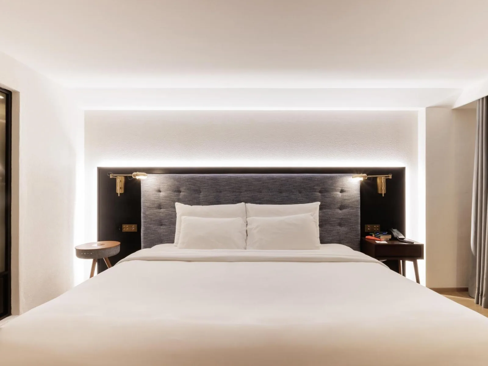 Stylish headboard in a king room at Public House Bangkok