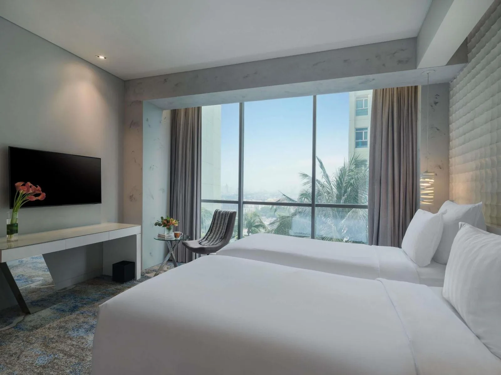 Chambre avec lits jumeaux et vue au Pullman Jakarta Central Park