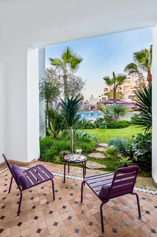 Outdoor patio seating at Pullman Mazagan Royal Golf & Spa in El Jadida