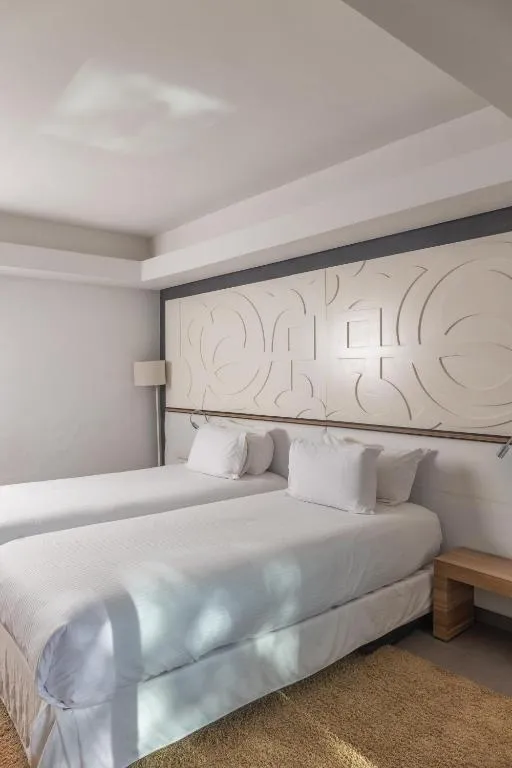Stylish bedroom at Pullman Mazagan Royal Golf & Spa