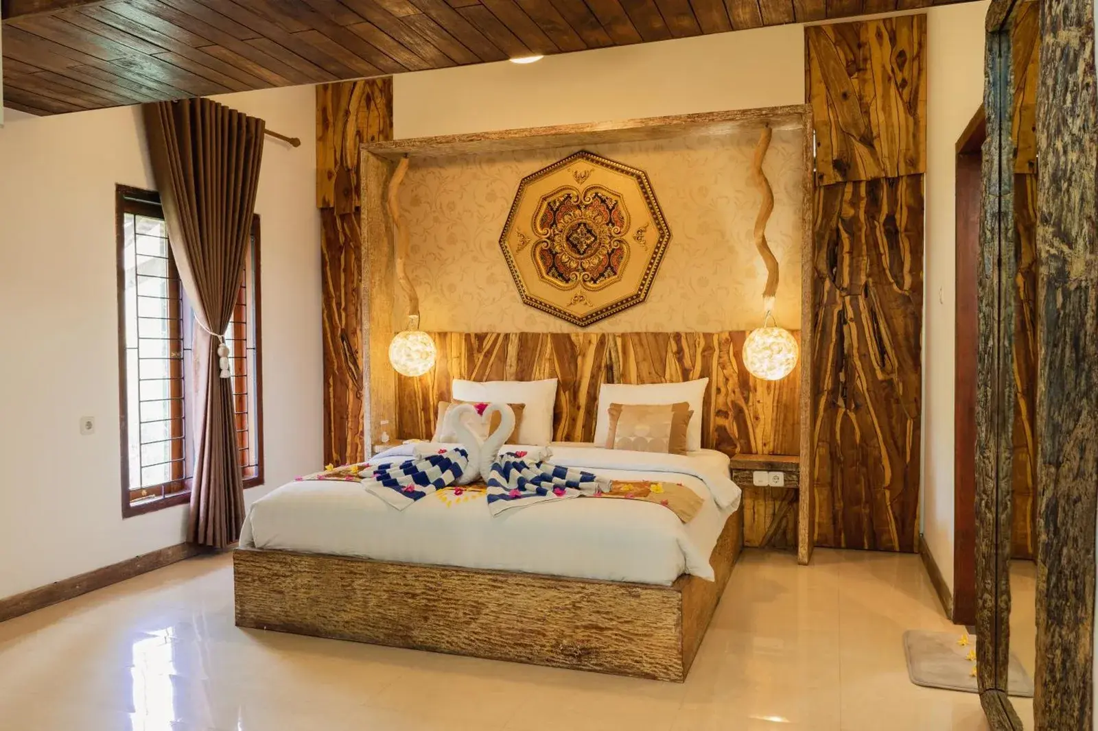Deluxe bedroom at Puri Samaira, Mataram