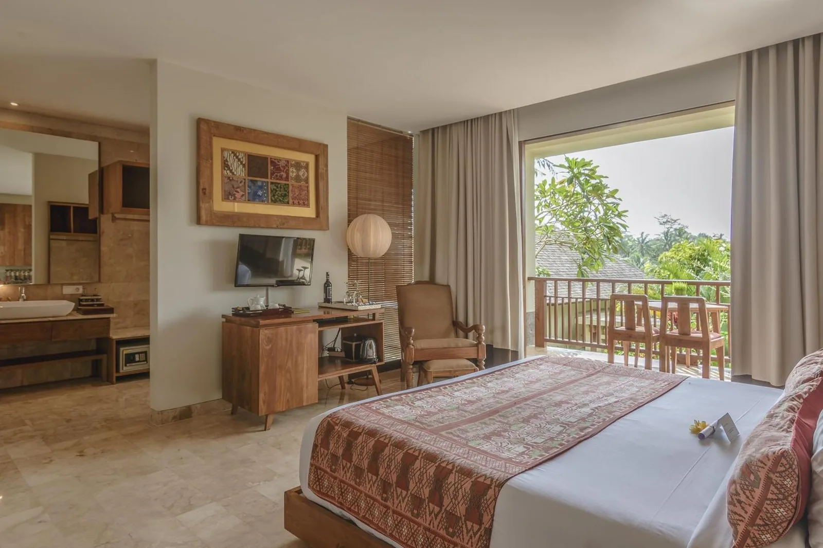 Cozy bedroom space at Puri Sebali Resort