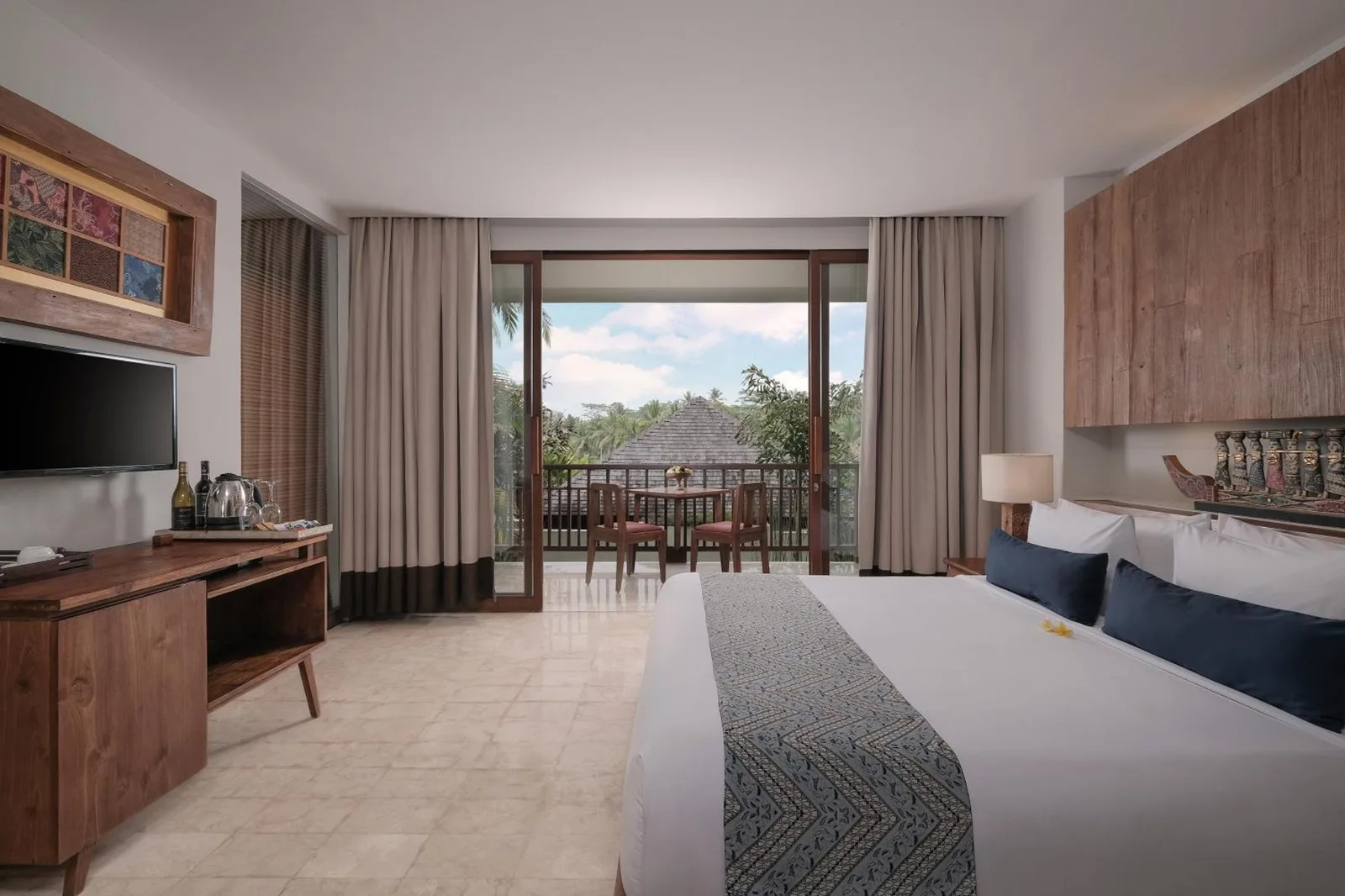 Deluxe room at Puri Sebali Resort featuring modern amenities