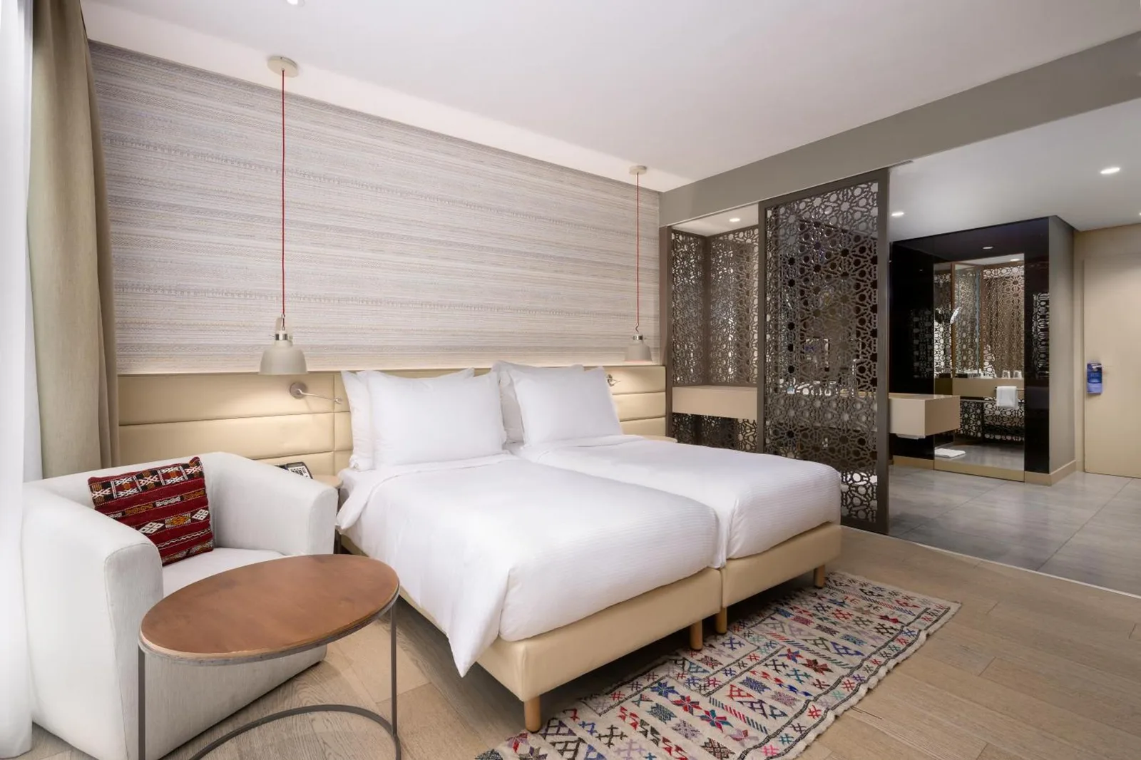 Habitación con dos camas individuales en Radisson Blu Marrakech, Carré Eden