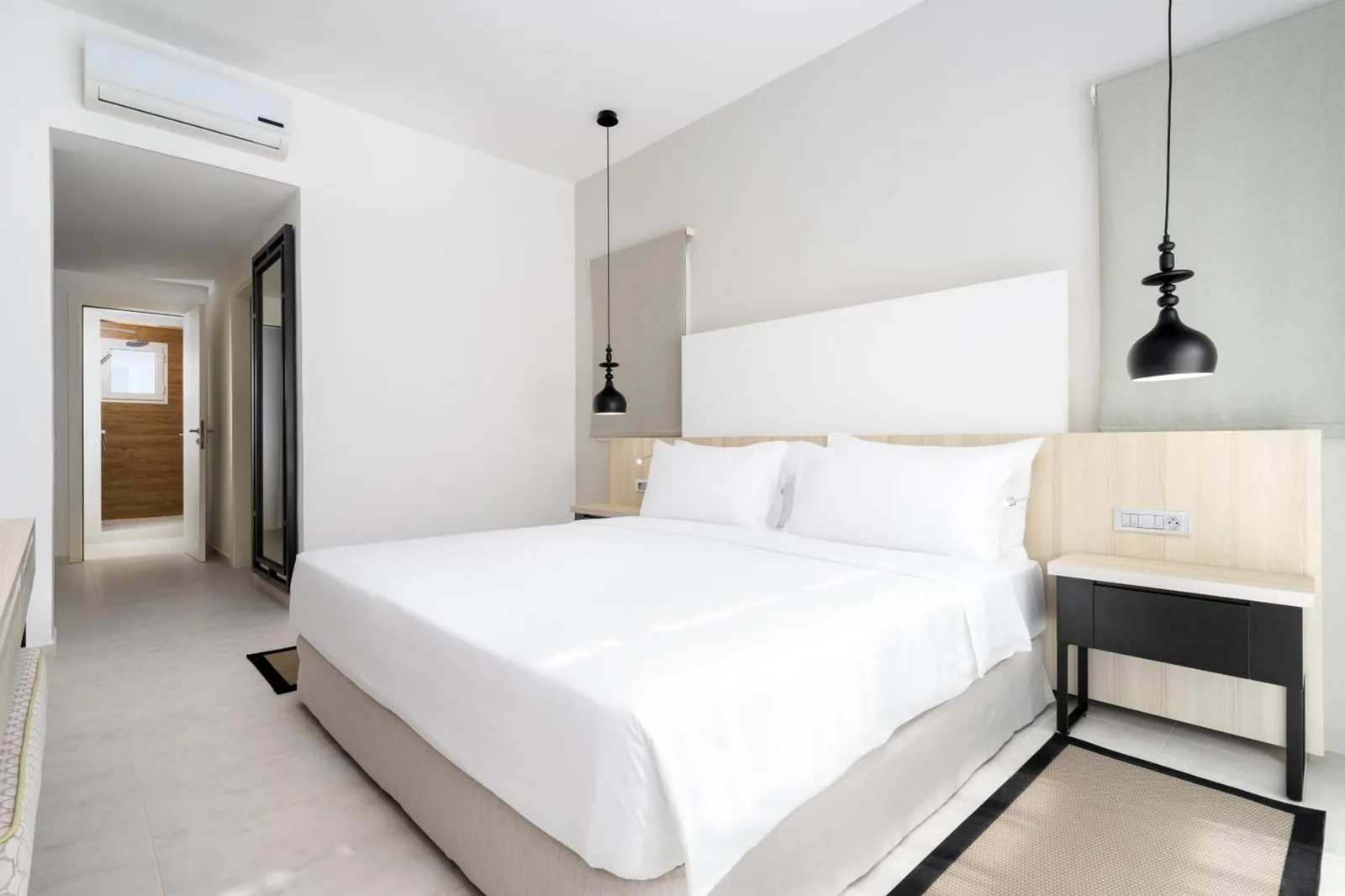 Stylish bedroom in Radisson Blu Residences, Saidia