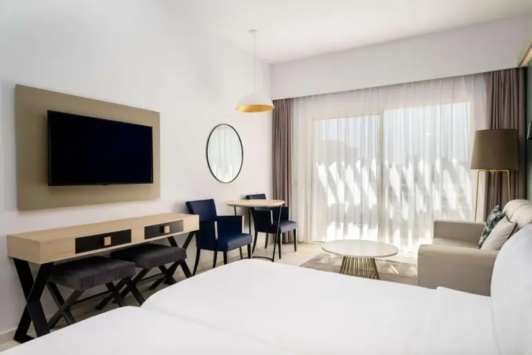 Dining area in guest room at Radisson Blu Resort Saidia Beach