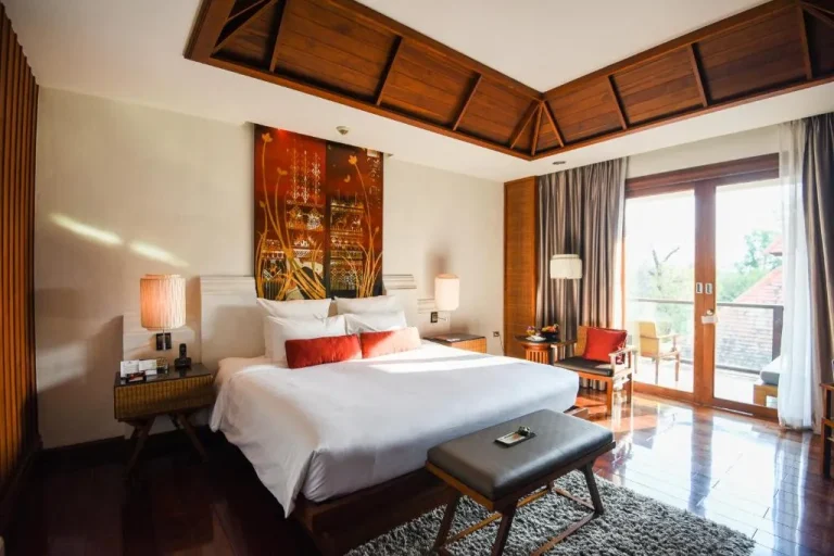 Spacious bedroom at RatiLanna Riverside Spa Resort