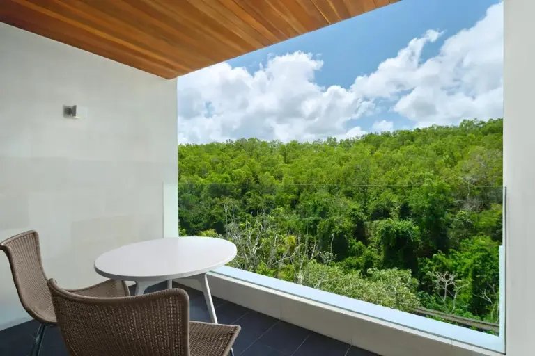 Balcony seating with views at Renaissance Bali Uluwatu Resort & Spa