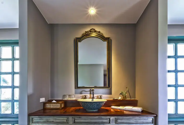 Reverie Siam bathroom sink with vintage decor