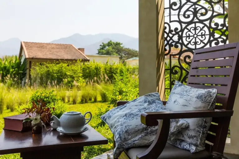 Reverie Siam seating with tea and books