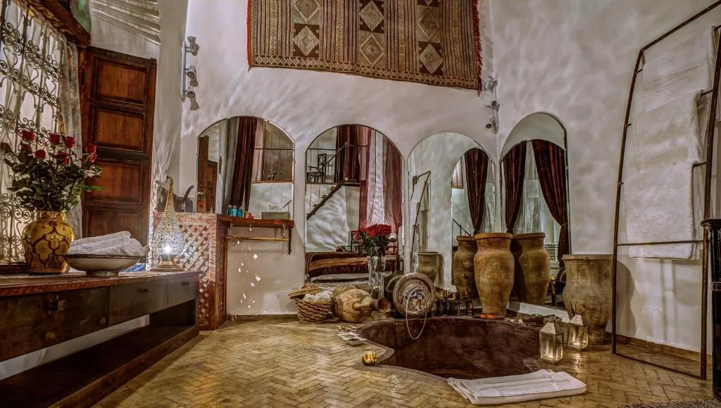 Decorative common area in Riad Almaz, Fes with traditional artifacts