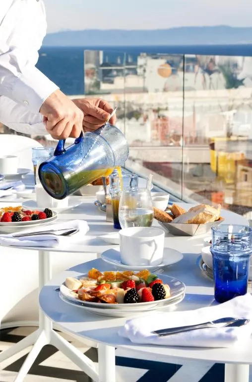 Breakfast being served on terrace at Riad Dar Saba, Tangier