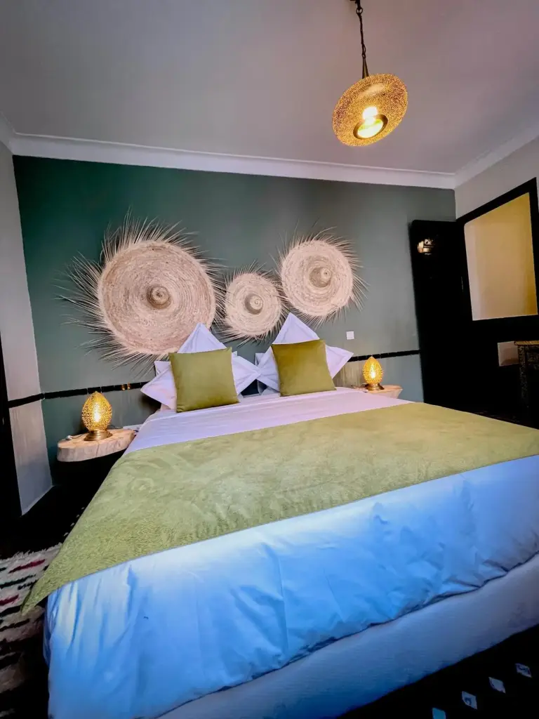 Riad FARASHA elegantly designed room with Moroccan motifs in Marrakech