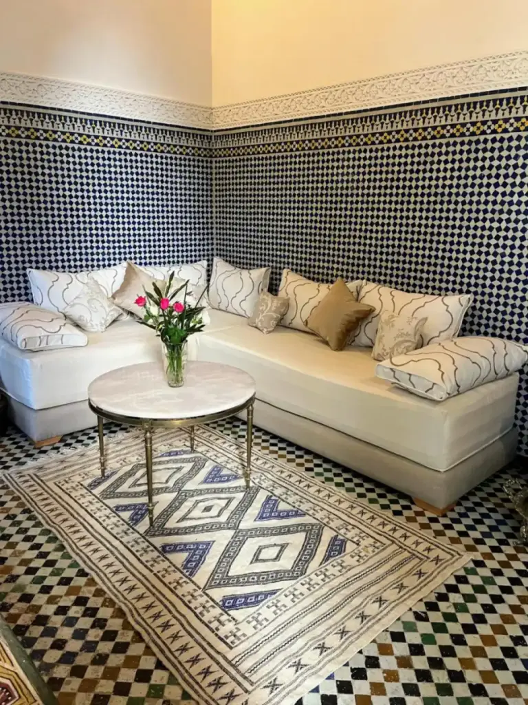 Riad Hanael Garden & Spa lounge area with floral arrangement