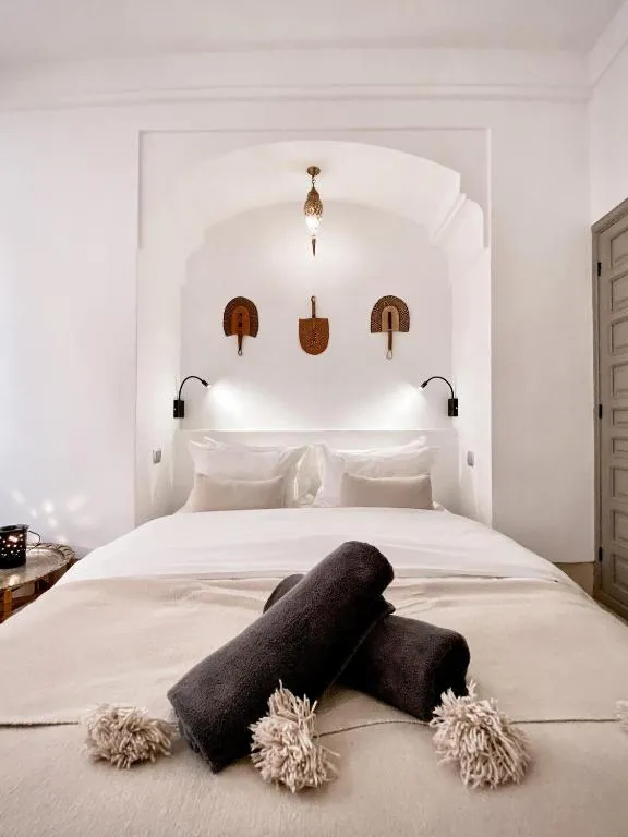Cozy bedroom at Riad Louhou in Marrakech
