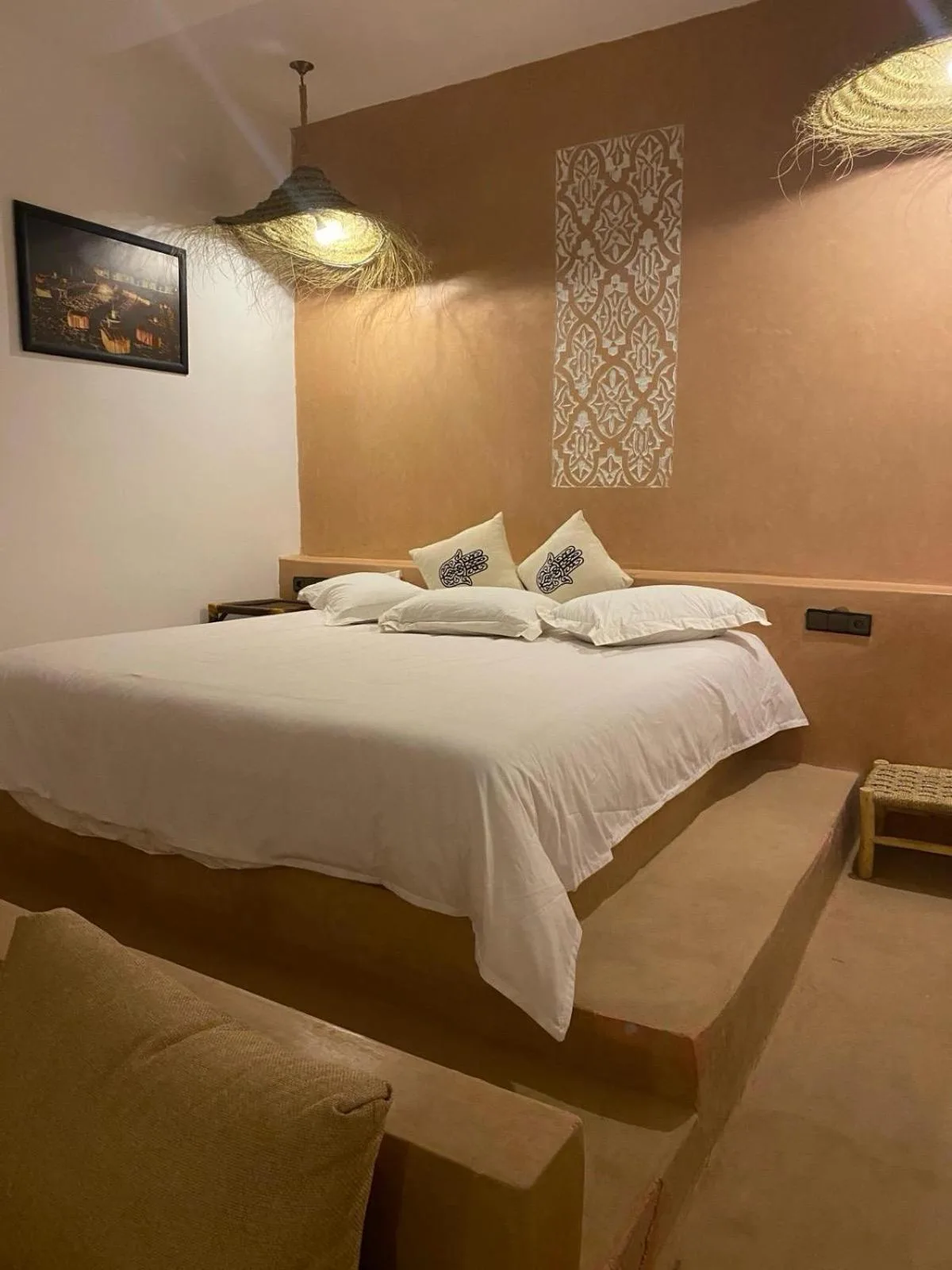 Elegant bedroom in Riad Suerteloca Merzouga with soft decor
