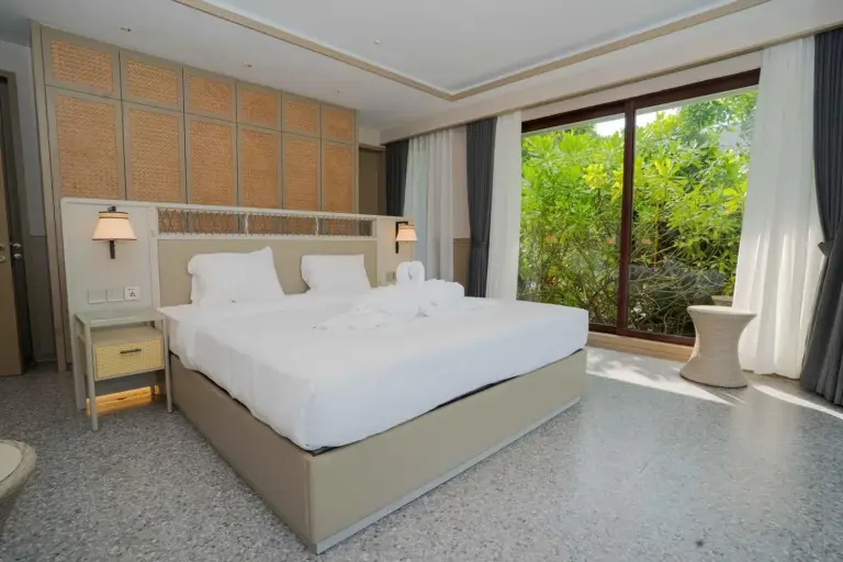 Bedroom interior at Riahi by Swiss-Belhotel, Batam