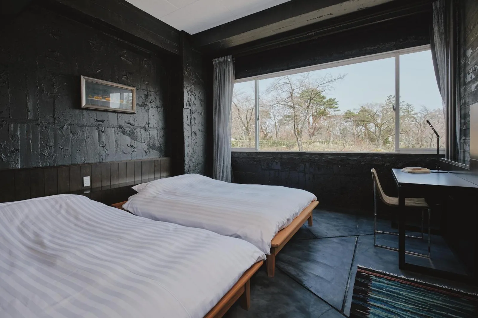 Twin bedroom at River Retreat Garaku in Toyama