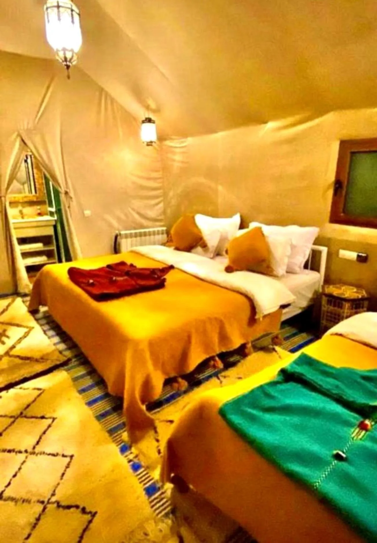Romantic Luxury Camp Merzouga family room with warm colors