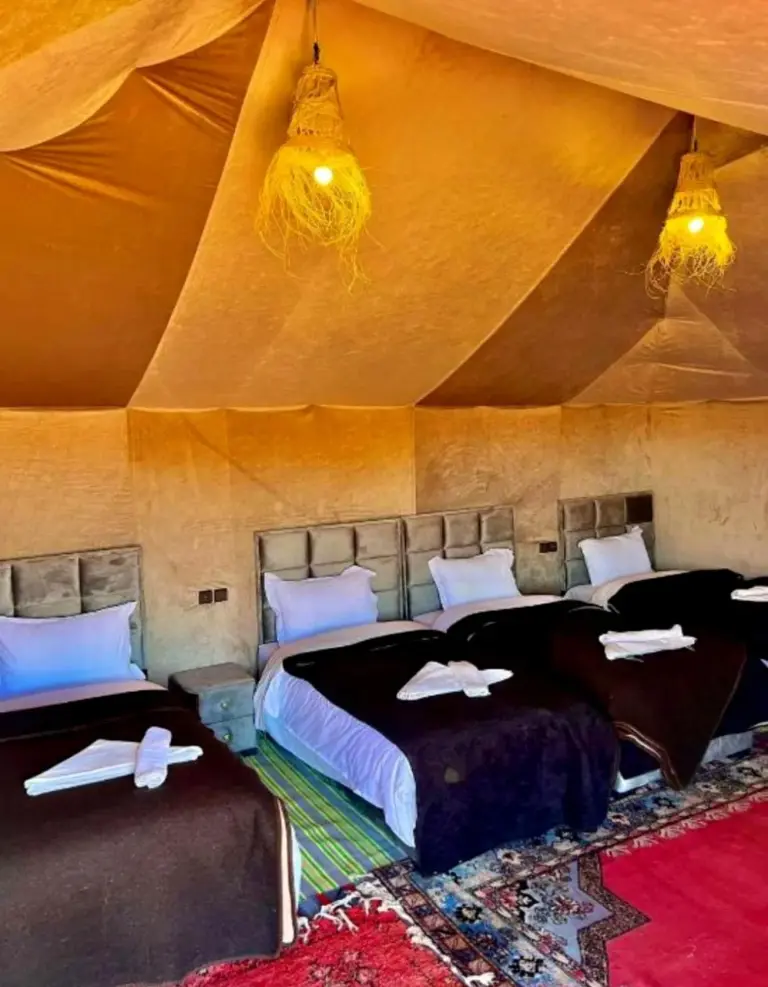 Romantic Luxury Camp Merzouga spacious tent with four beds