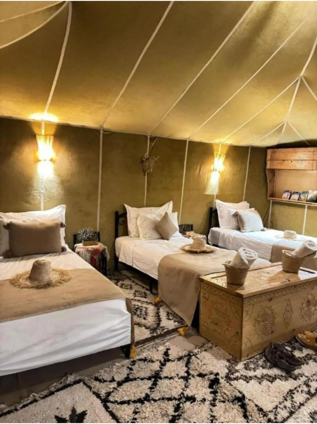 Rosara Luxury Camp in Merzouga triple tent room with three single beds and traditional decor