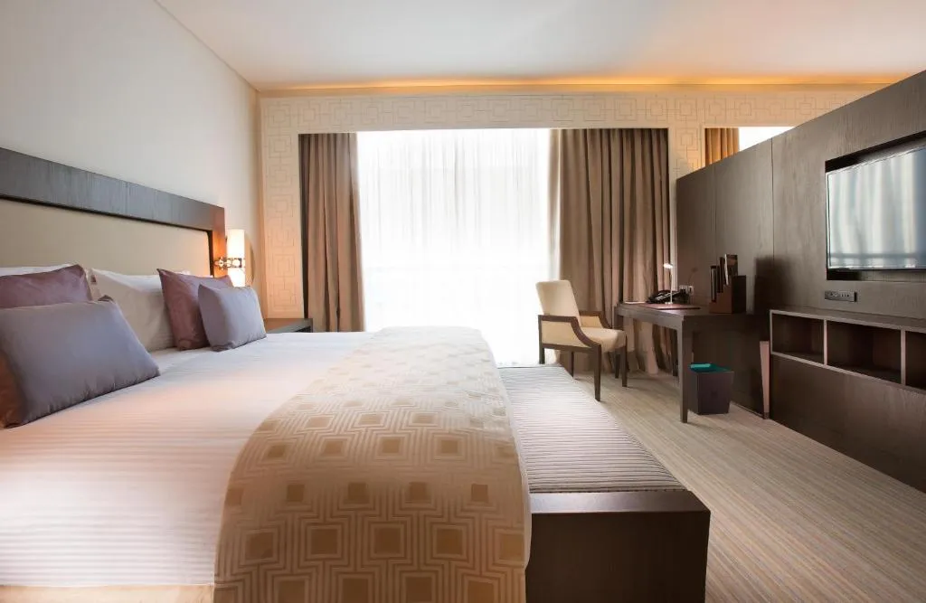 Bedroom at Royal M Hotel Fujairah by Gewan