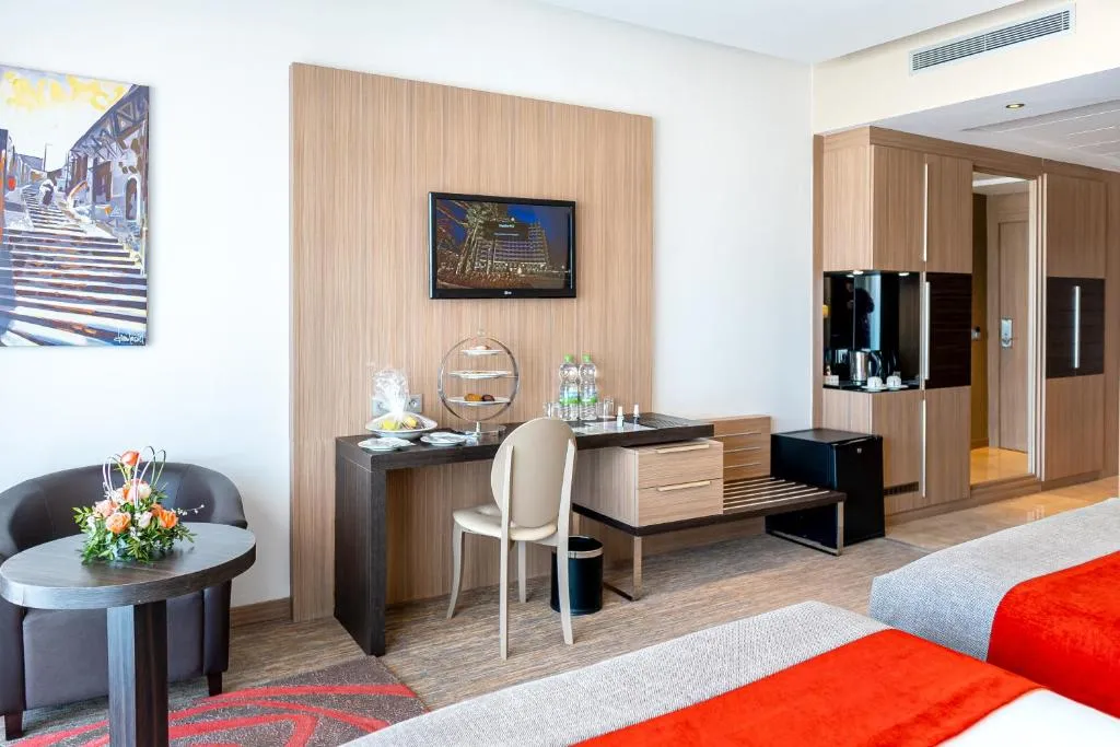 Royal Tulip City Center room with modern amenities