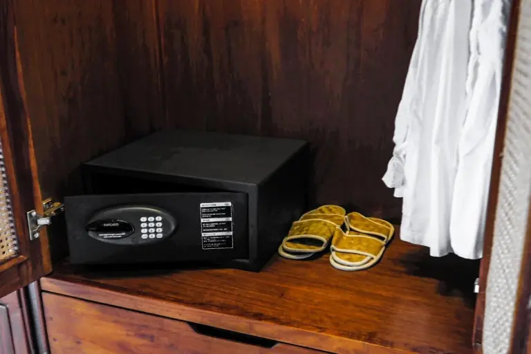 a microwave and pair of shoes in a room at Sampatti Villas in Seminyak