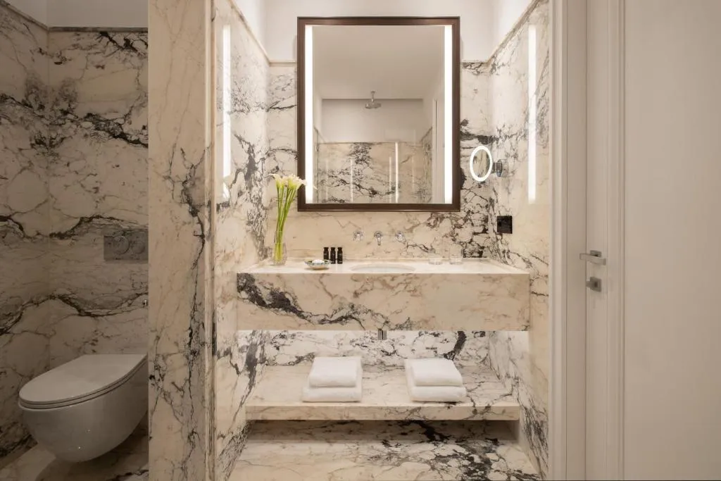Luxurious marble bathroom in San Domenico Palace, A Four Seasons Hotel in Taormina