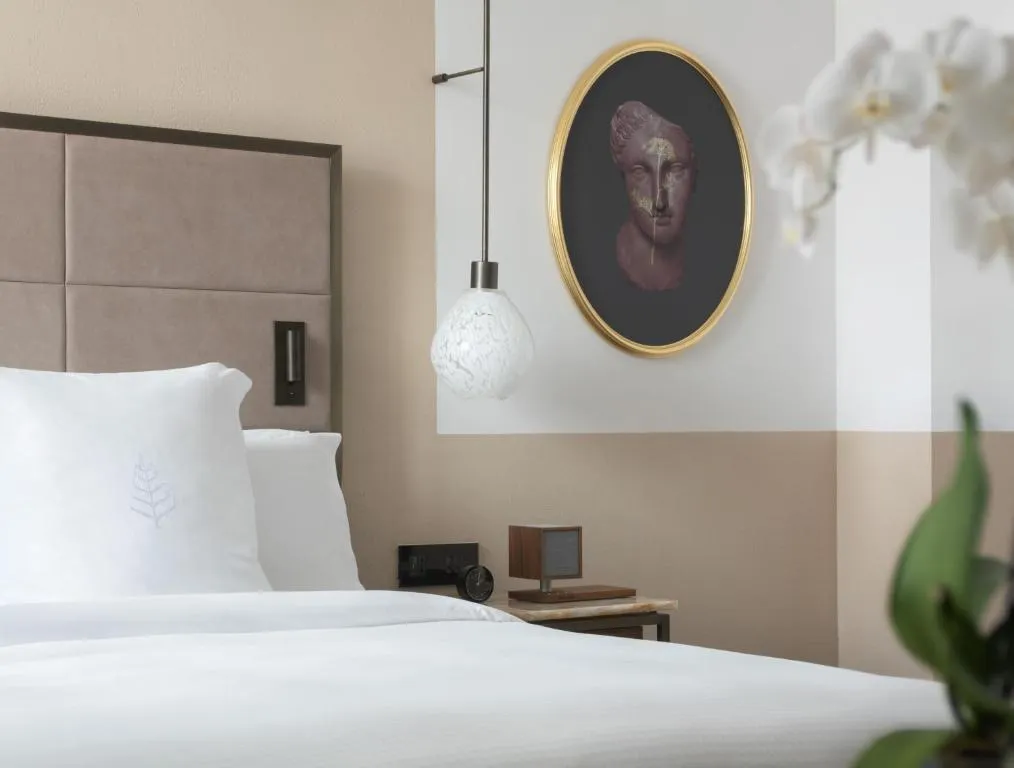Elegant bedroom in San Domenico Palace, A Four Seasons Hotel in Taormina