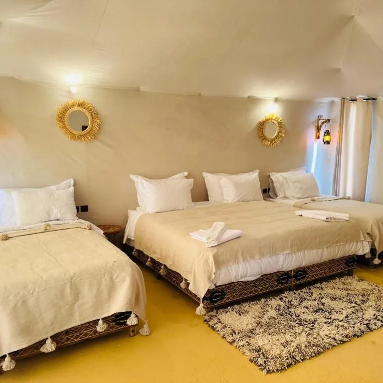 Interior of Sand Dunes Luxury Camp Triple Room in Merzouga