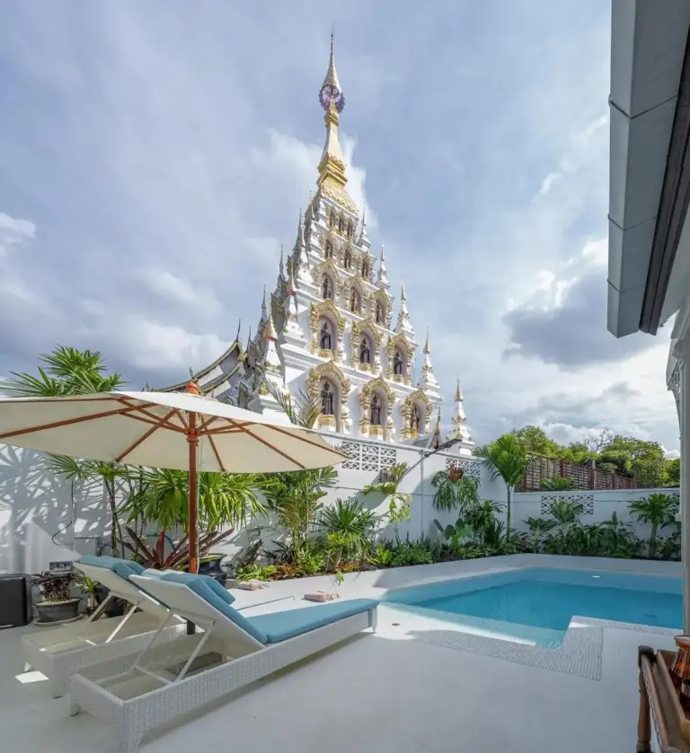 View of a temple from Santitham Pool Villa in Chiang Mai