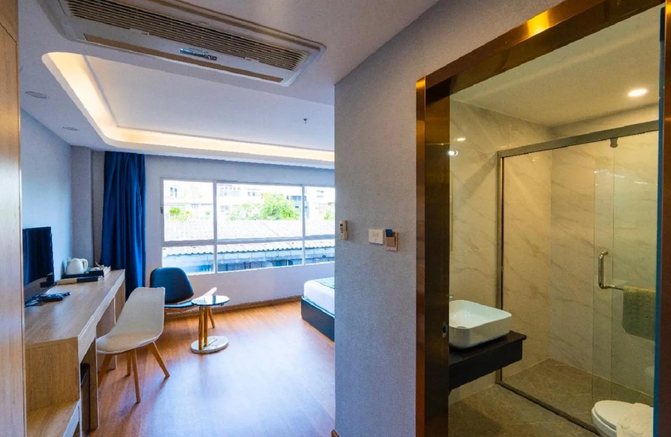 Modern bathroom entrance in Sapphire Hotel Silom Bangkok guest room in Bangkok