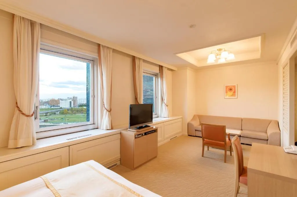 Sapporo Park Hotel city view room with sofa and TV