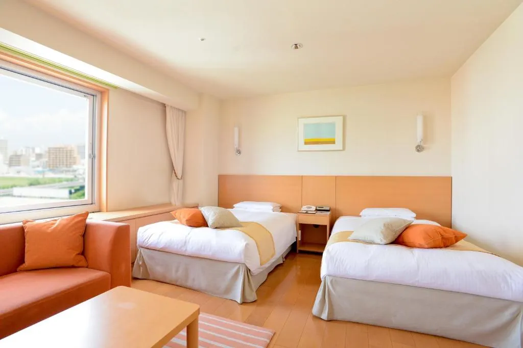 Sapporo Park Hotel family room with seating area