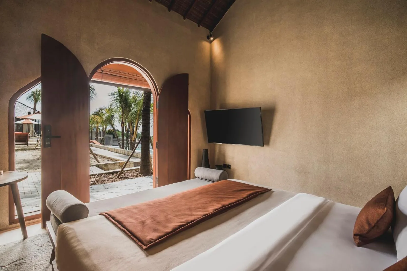 Seascape Resort & Spa Uluwatu by Ini Vie Hospitality – Uluwatu, Indonesia hotel – a poster for a car dealership with two people getting into a car at Seascape Resort & Spa Uluwatu by Ini Vie Hospitality in Uluwatu