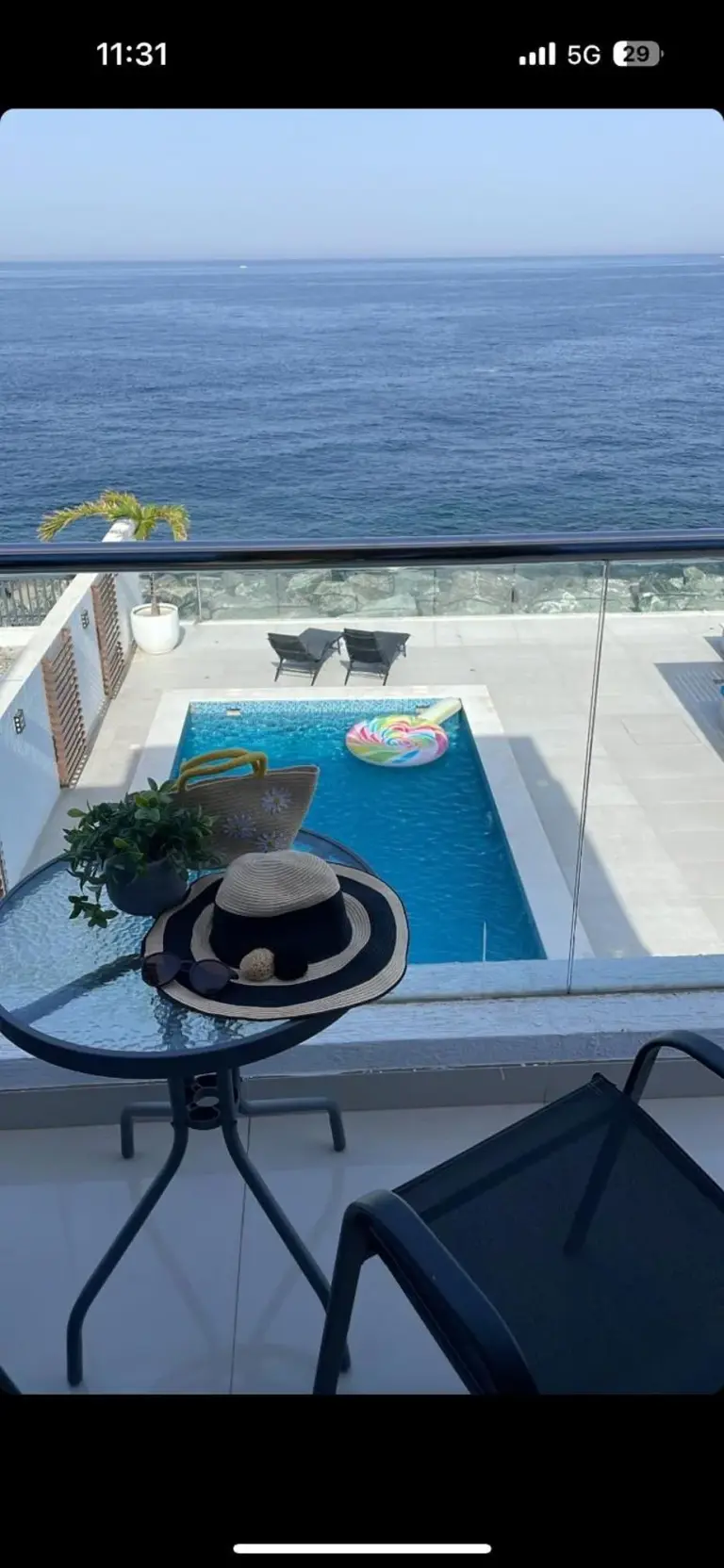 Balcony view of Seascape Villa pool and ocean