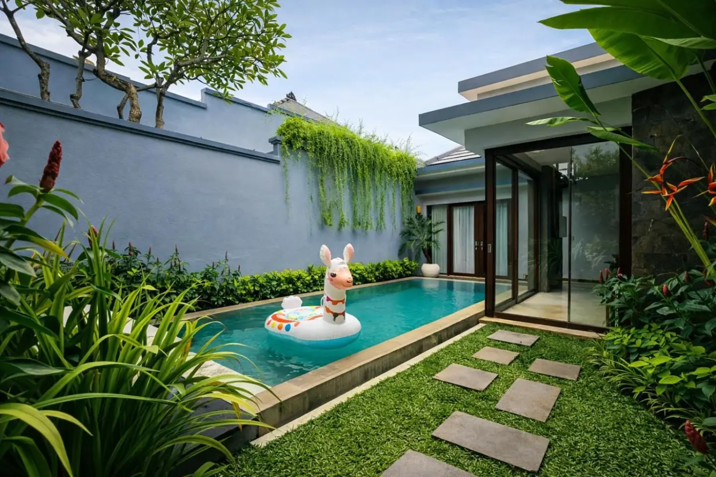 Poolside garden at Seminyak Icon by Karaniya Experience
