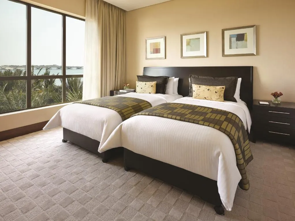 Shangri-La Hotel Apartments Qaryat Al Beri twin bedroom