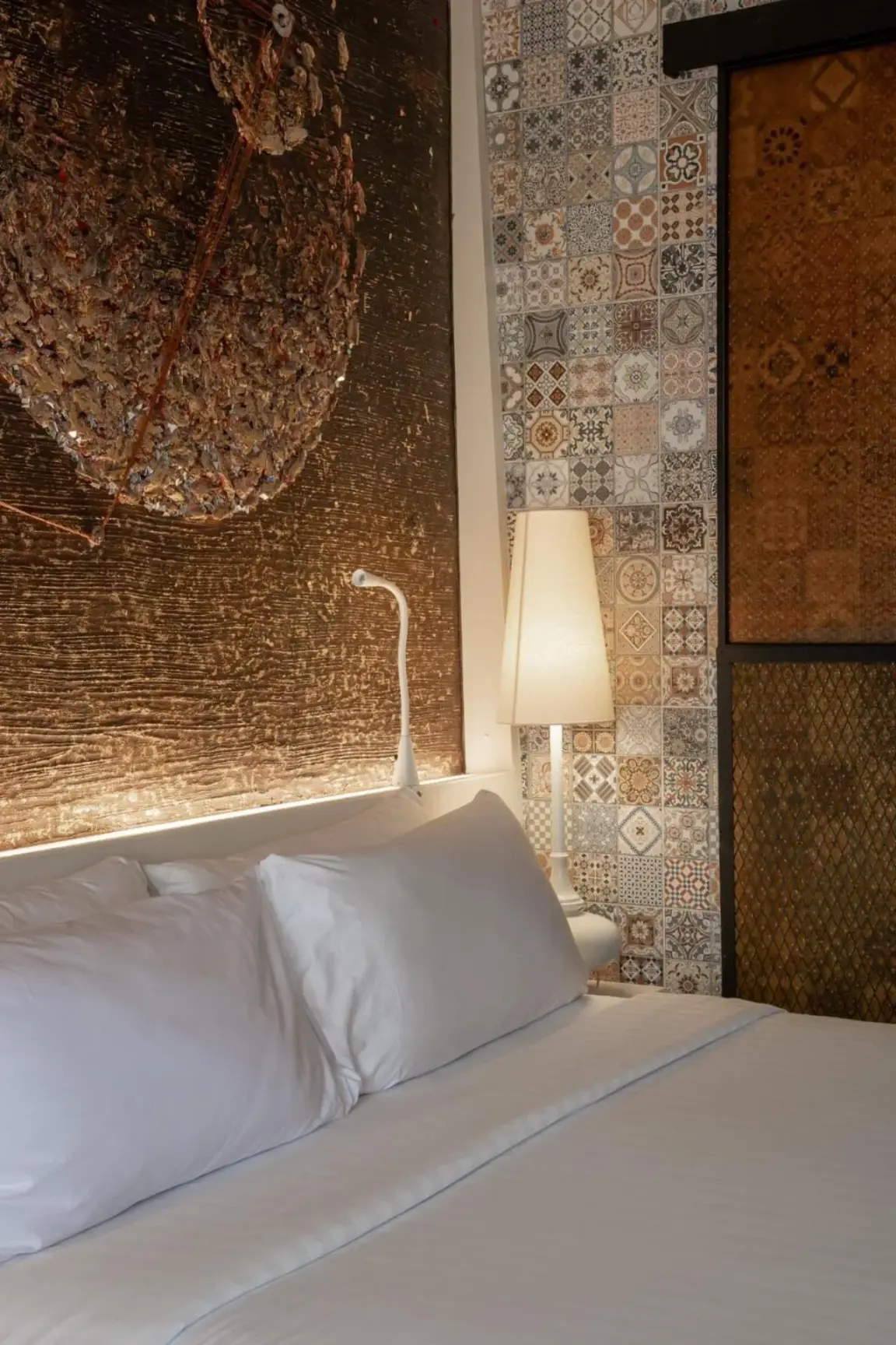 Elegant decor in a guest room at Siam At Siam Design Hotel Bangkok