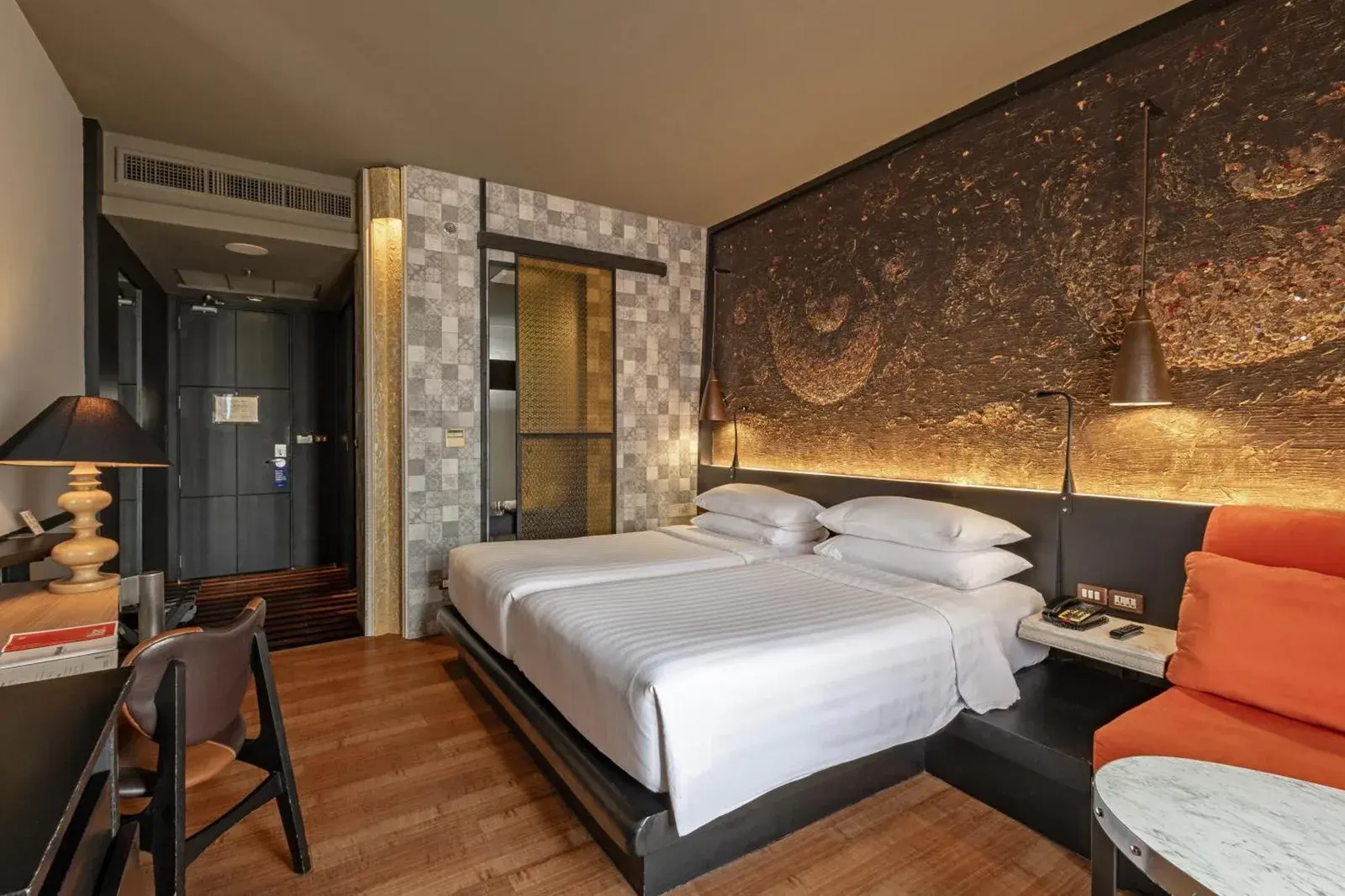 Stylish guest room at Siam At Siam Design Hotel Bangkok