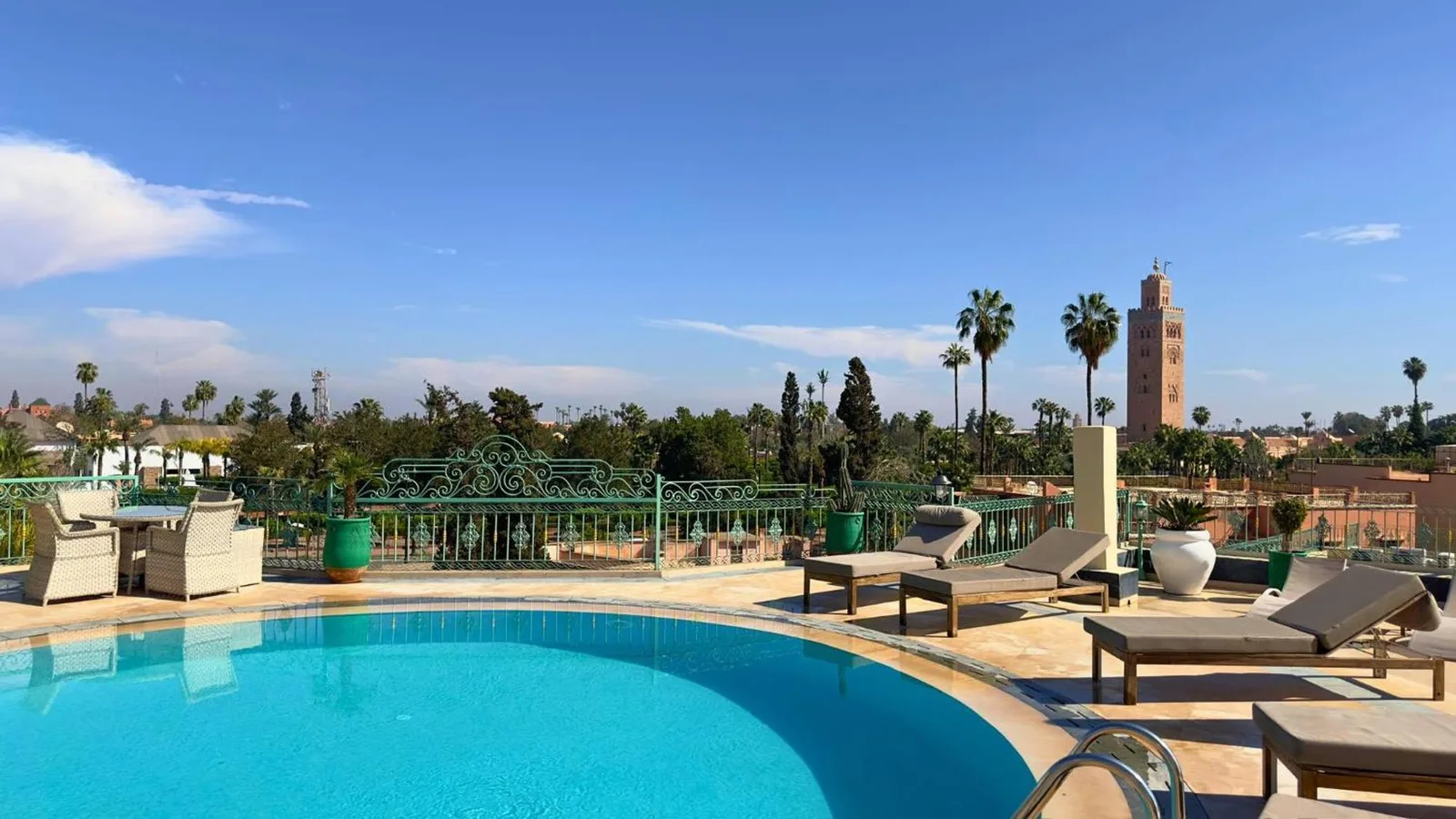 Sillage Palace Sky & Spa pool view with a glimpse of Marrakech