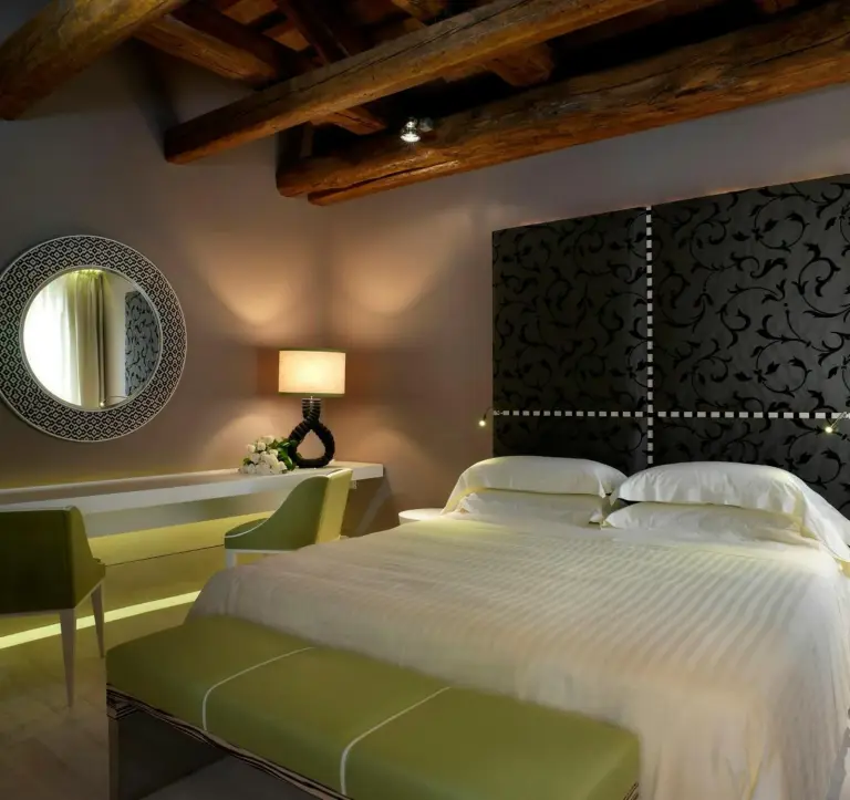 Sina Centurion Palace habitación elegante con ambiente acogedor