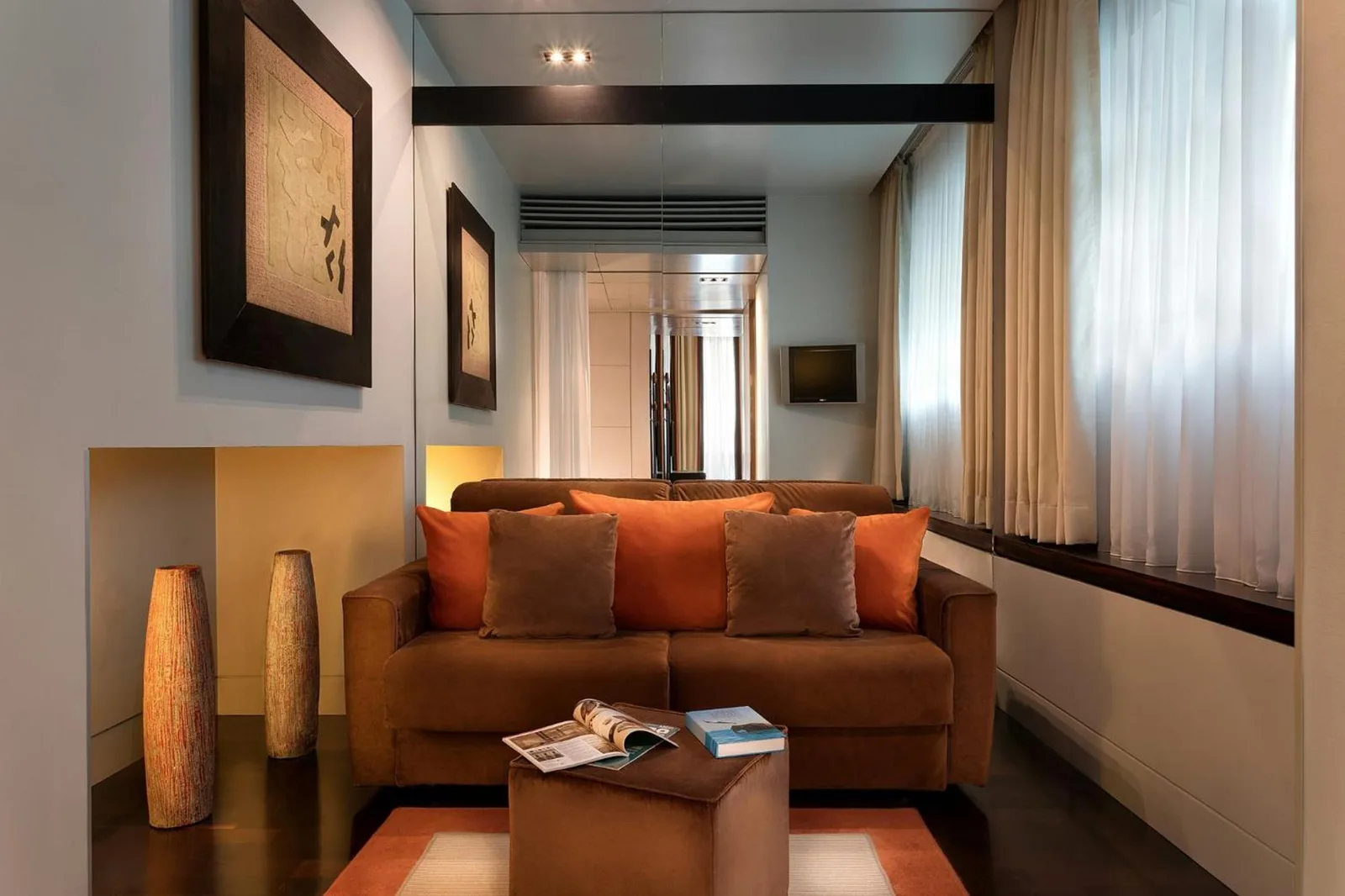 Acogedora área de salón en Sina The Gray en Milán
