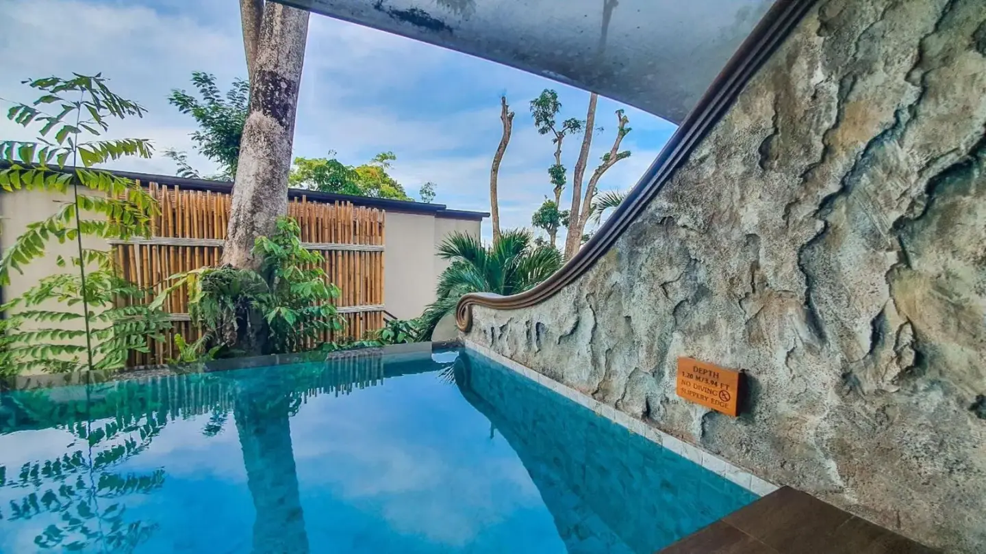 View from the poolside at SINAE Phuket Luxury Hotel.