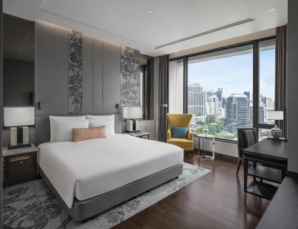 Guest room with city view at Sindhorn Kempinski Hotel Bangkok