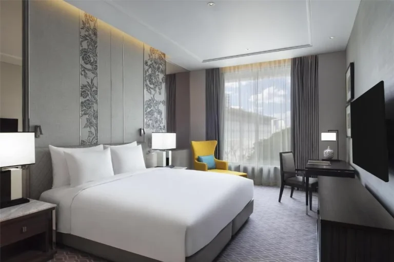 Elegant guest room at Sindhorn Kempinski Hotel Bangkok